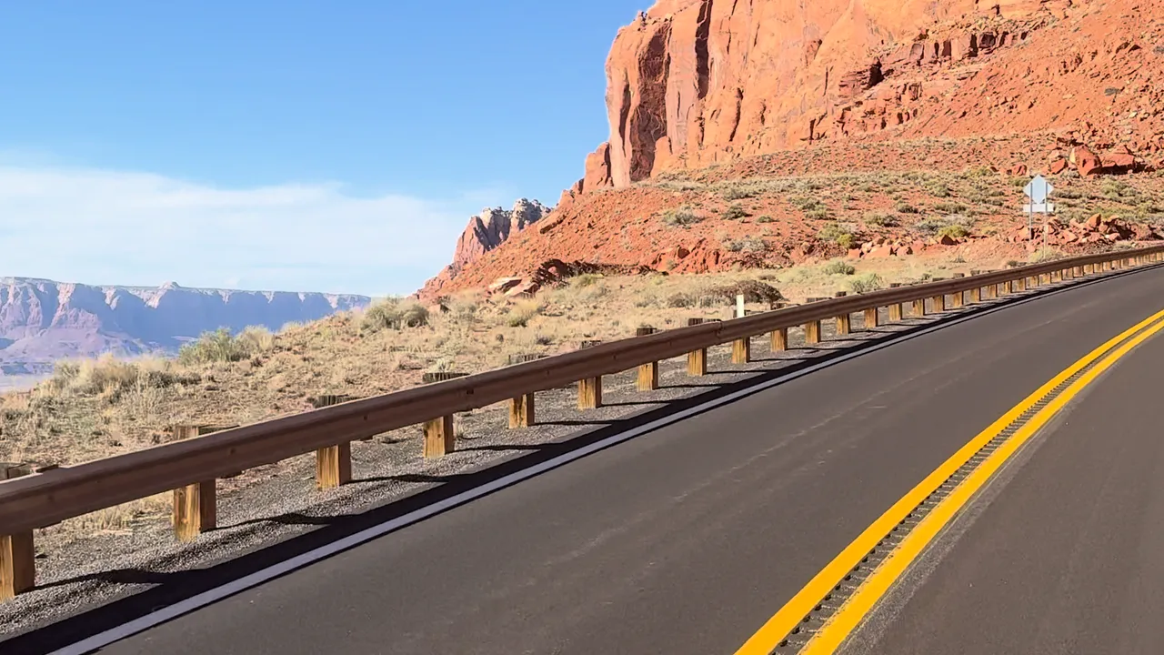 Open desert highway through red-rock country