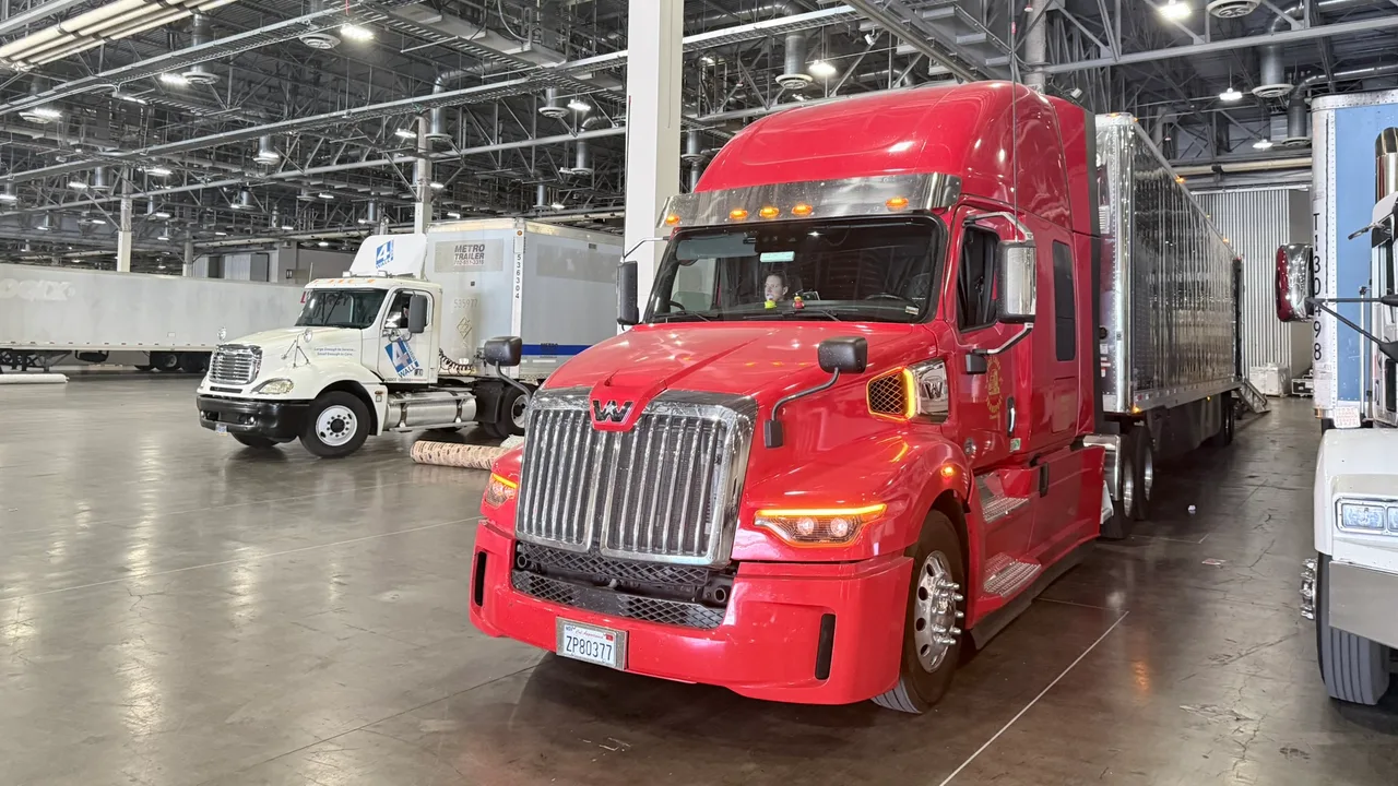 Fire Chief Transport's red truck staged inside a warehouse